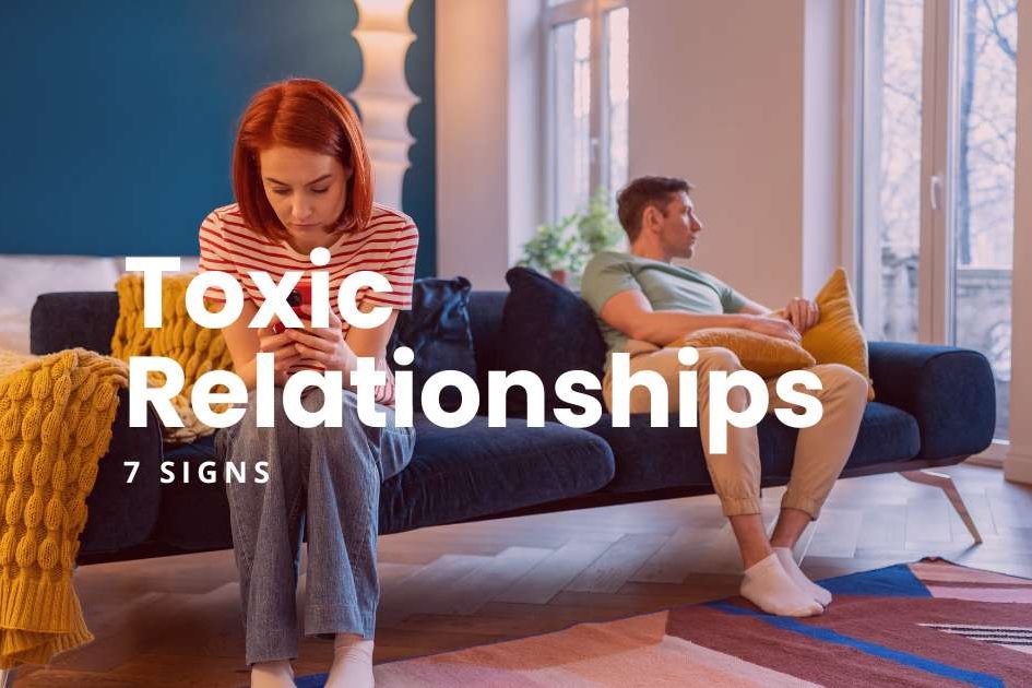 7 Toxic Relationship Signs - featured image. A couple sitting on a blue sofa with a yellow throw blanket, The man is on the far right, looing out through a glass door and the woman on the left, busy on her phone.