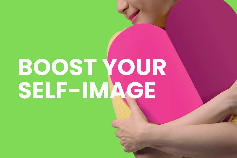 Featured article image. White writing says, boost your self-image. Neon green background and foreground with woman in yellow top hugging a two tone large pink heart.