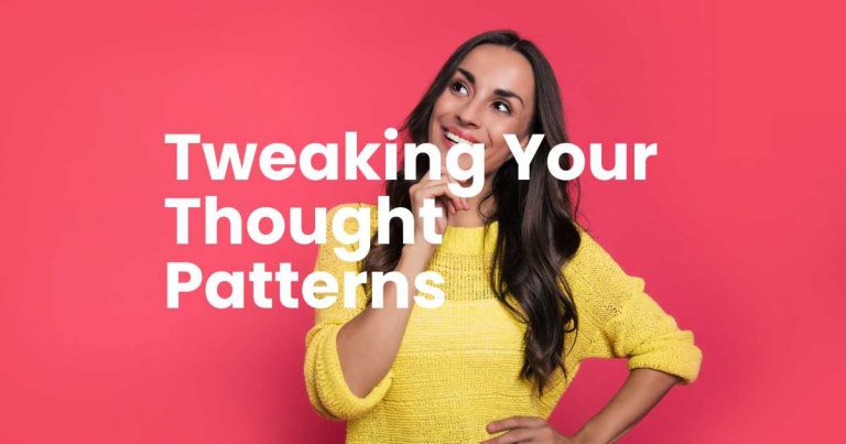 Woman in a yellow knitted top with long brown hair, smiling looking up to her right side. With a thoughtful gesture by holding her right hand to her face. Letters in white writing - Tweaking your thought patterns.